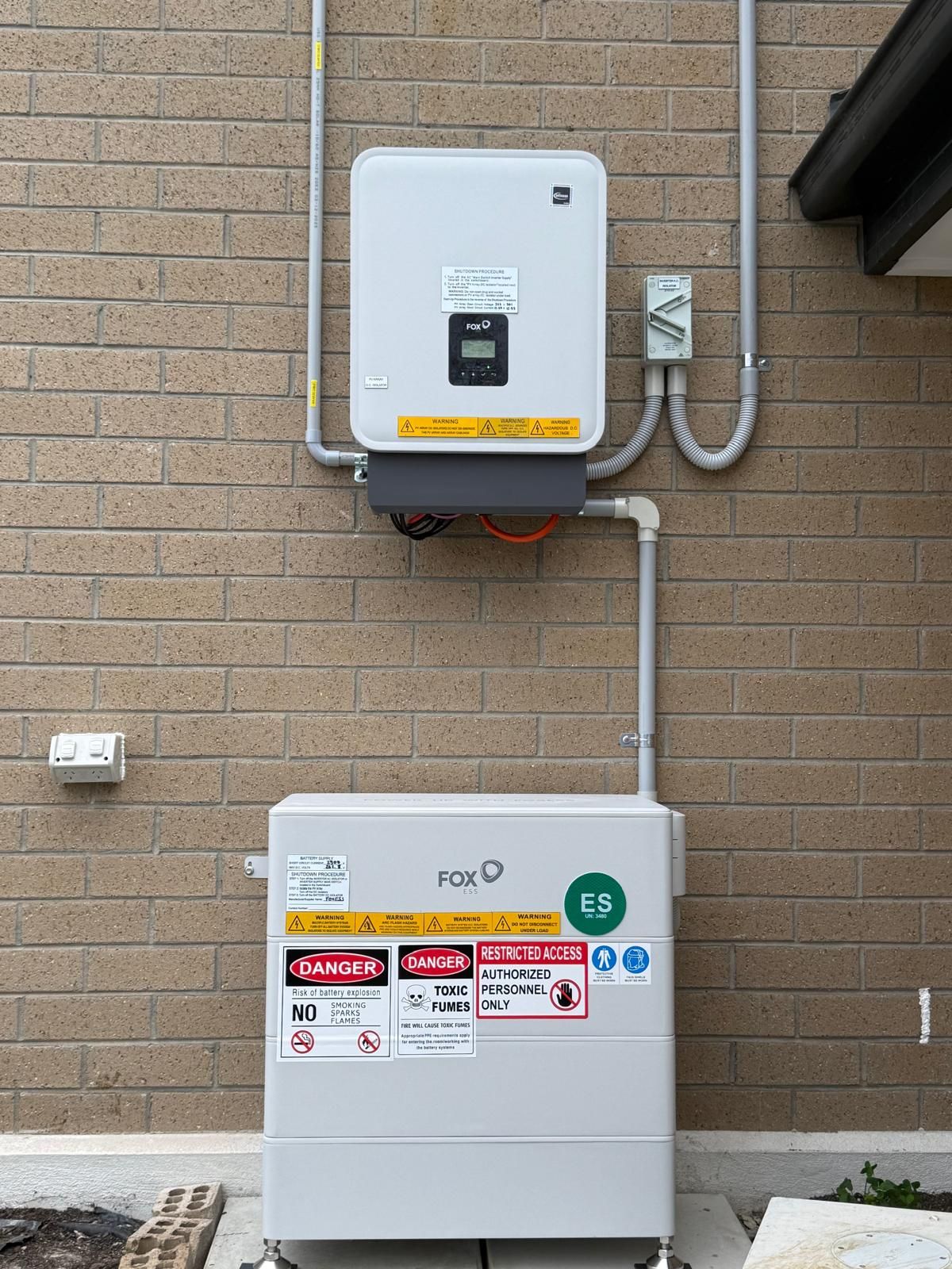 Twin Sofar battery cabinets installed side by side in a garage