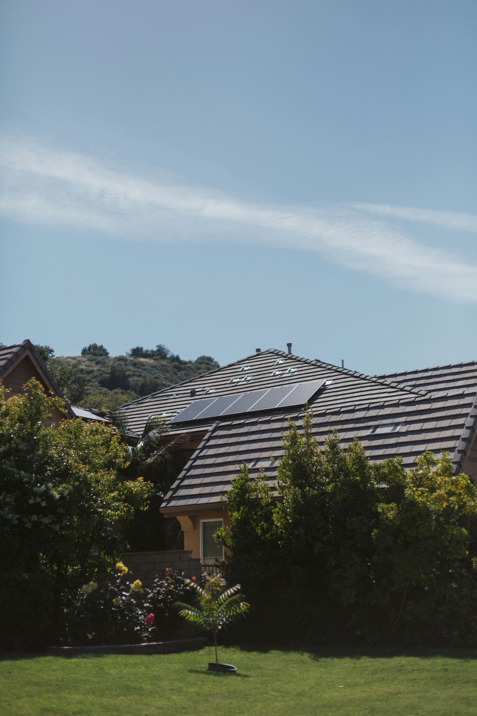 Rooftop solar panel installation on a family home